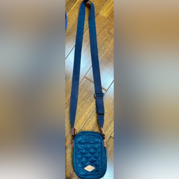 Mz Wallace Blue Quilted Crossbody Bag
26” adjustable strap - Picture 2 of 5